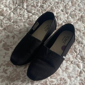 TOMS Black Canvas Slip-Ons